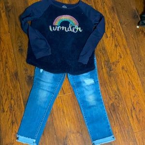 Very soft sweater and blue jeans